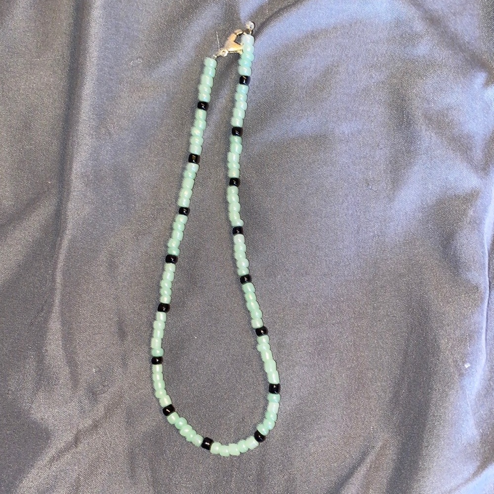 mint green and black necklace